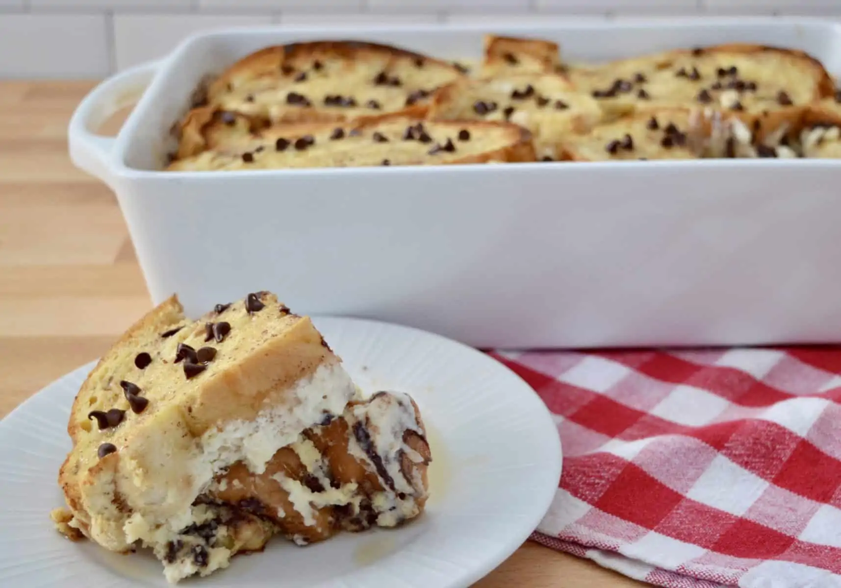 Slice of cannoli baked French toast on a plate. 