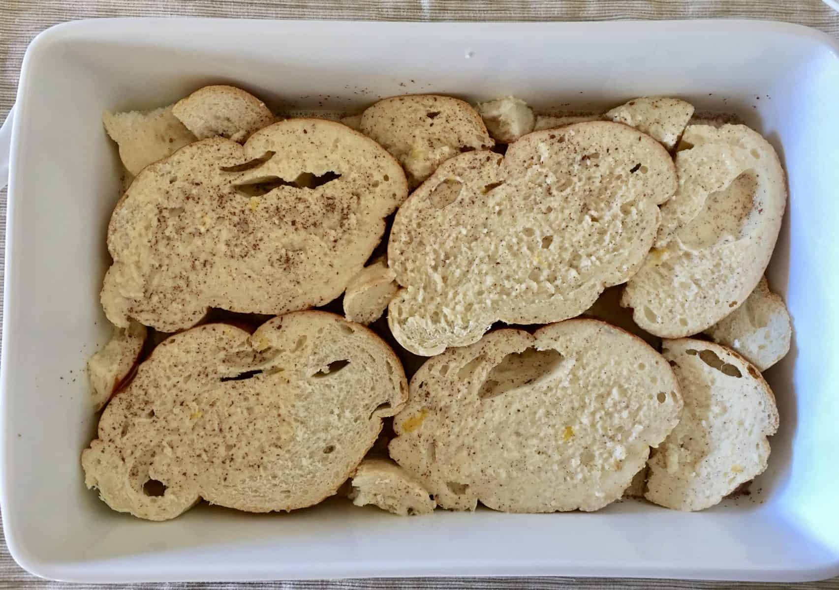 custard poured over the bottom slices of bread in the casserole dish. 