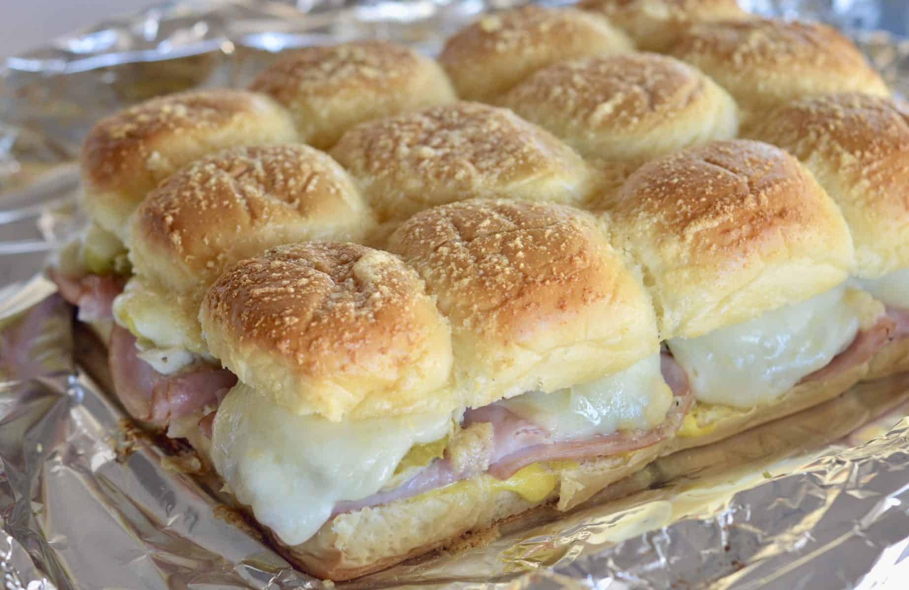 sandwiches on a foil lined baking sheet. 