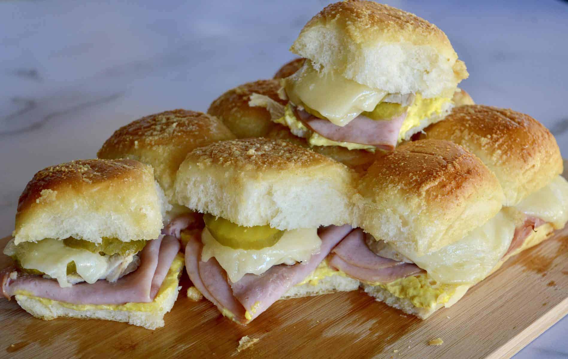 Pull Apart Cuban Sliders on a wood cutting board