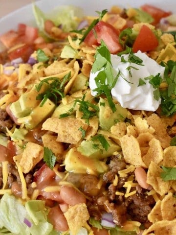 Frito Taco Salad in a white serving bowl.