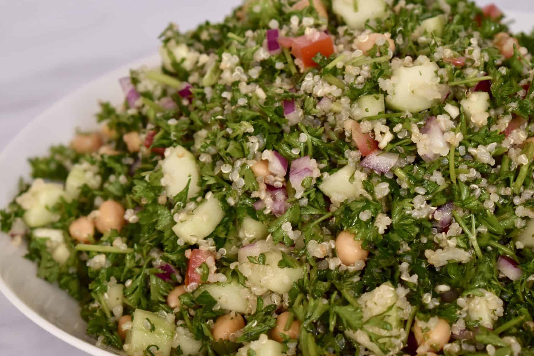 parsley quinoa chickpea salad is like tabbouli .