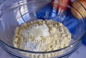 almond flour and baking soda in a glass mixing bowl.