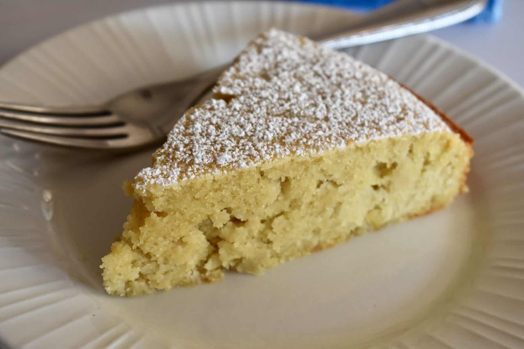 almond flour apple cake on a white plate. 
