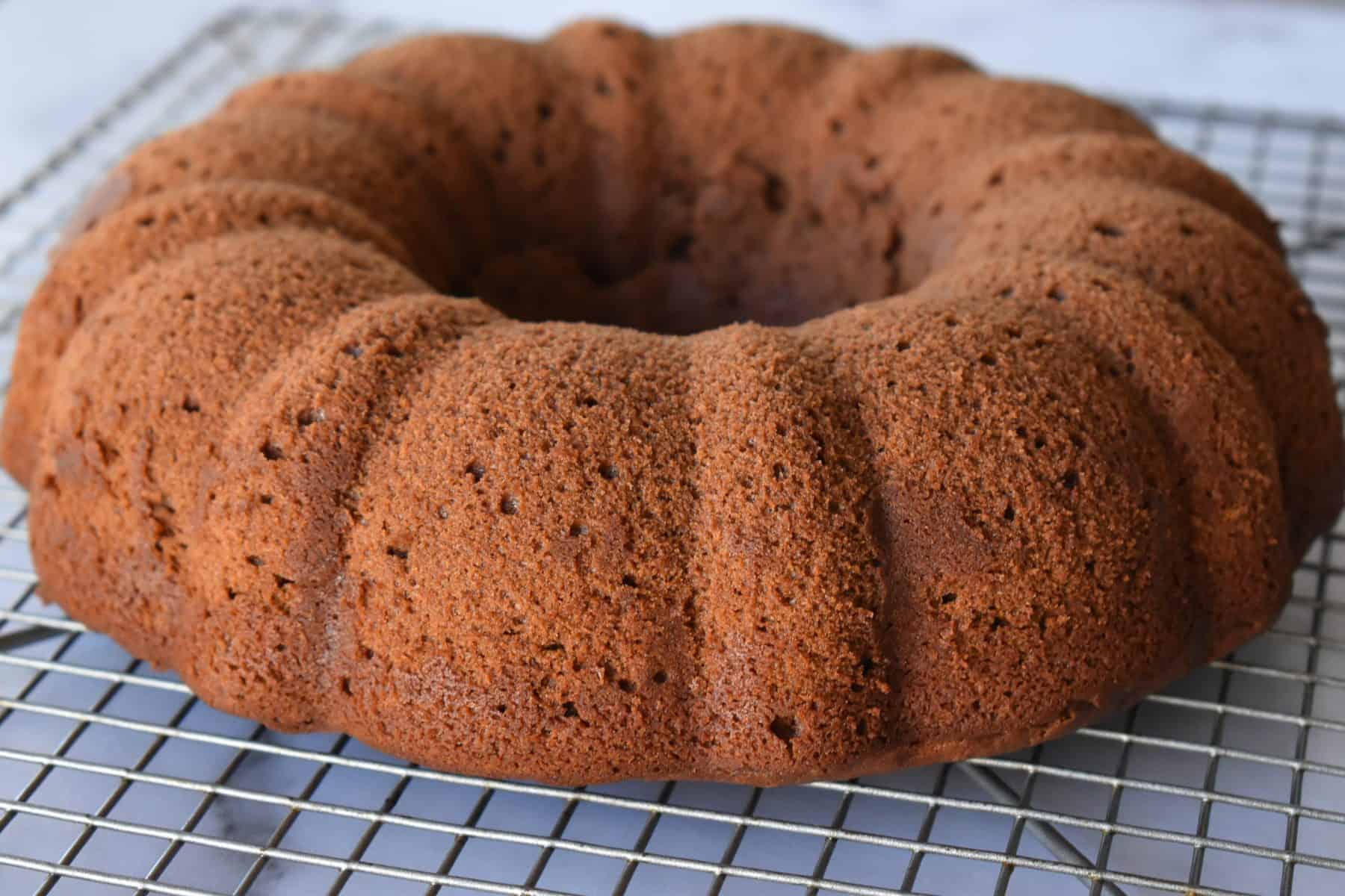 Chocolate Ricotta Bundt Cake cooling on a wire rack. 