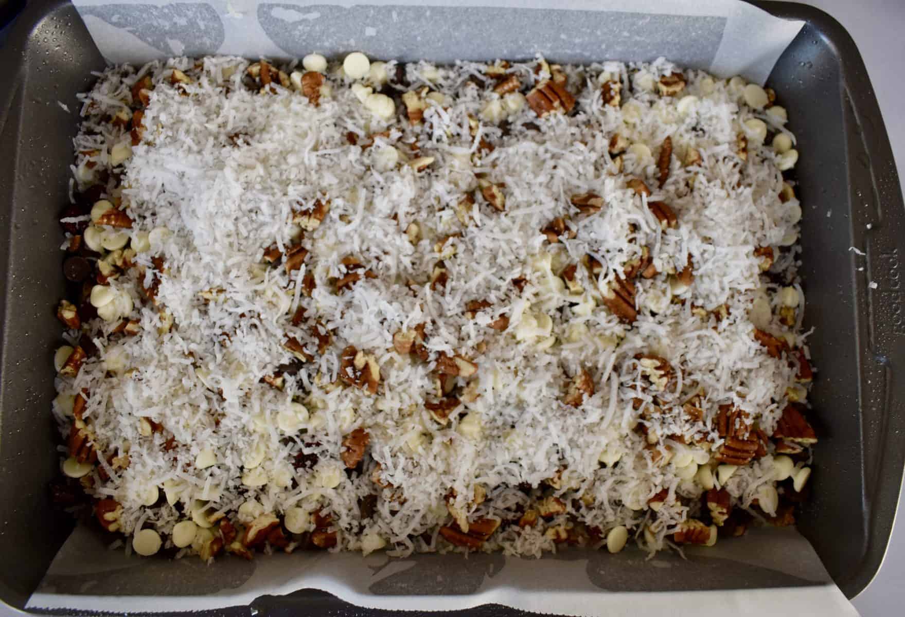 Cranberry Magic Bars in a baking tray. 