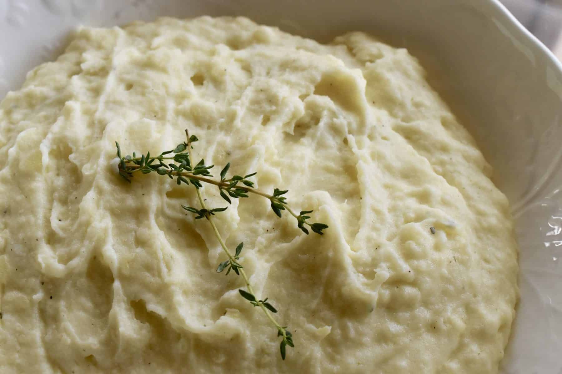 Boursin Mashed Potatoes in a white bowl. 