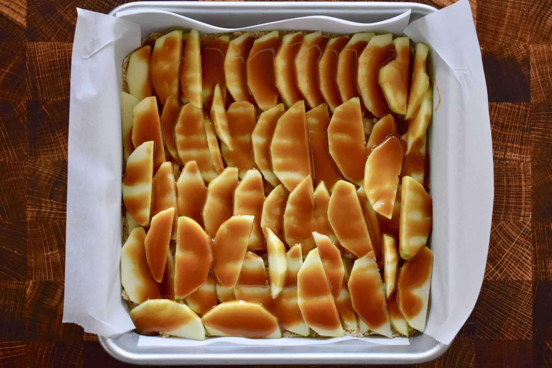 caramel sauce poured over the sliced apple layer. 