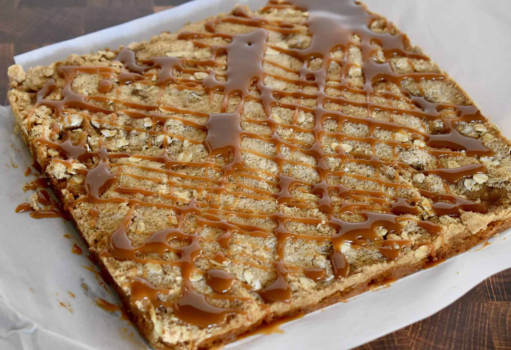 Caramel Apple Squares drizzled with caramel sauce. 