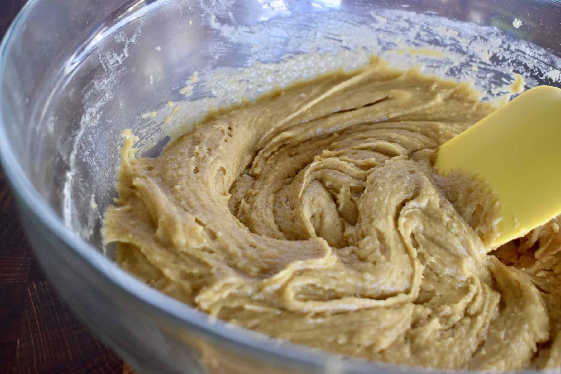 flour added to the mixture in the clear bowl. 