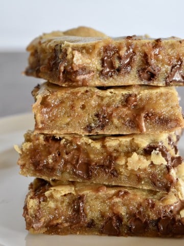 Milky Way Blondies stacked on top of each other.
