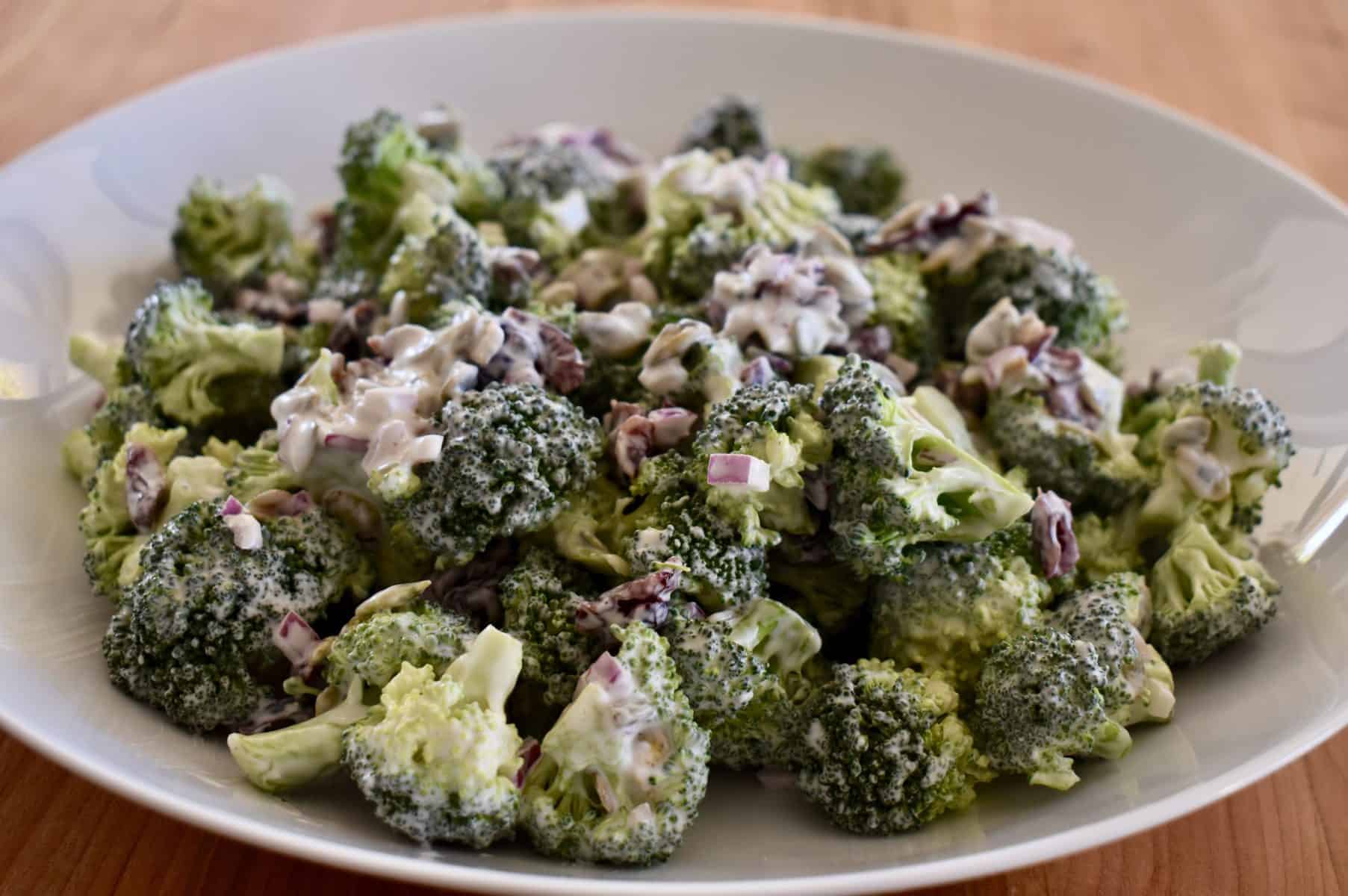 Broccoli Cranberry Salad in a white bowl. 