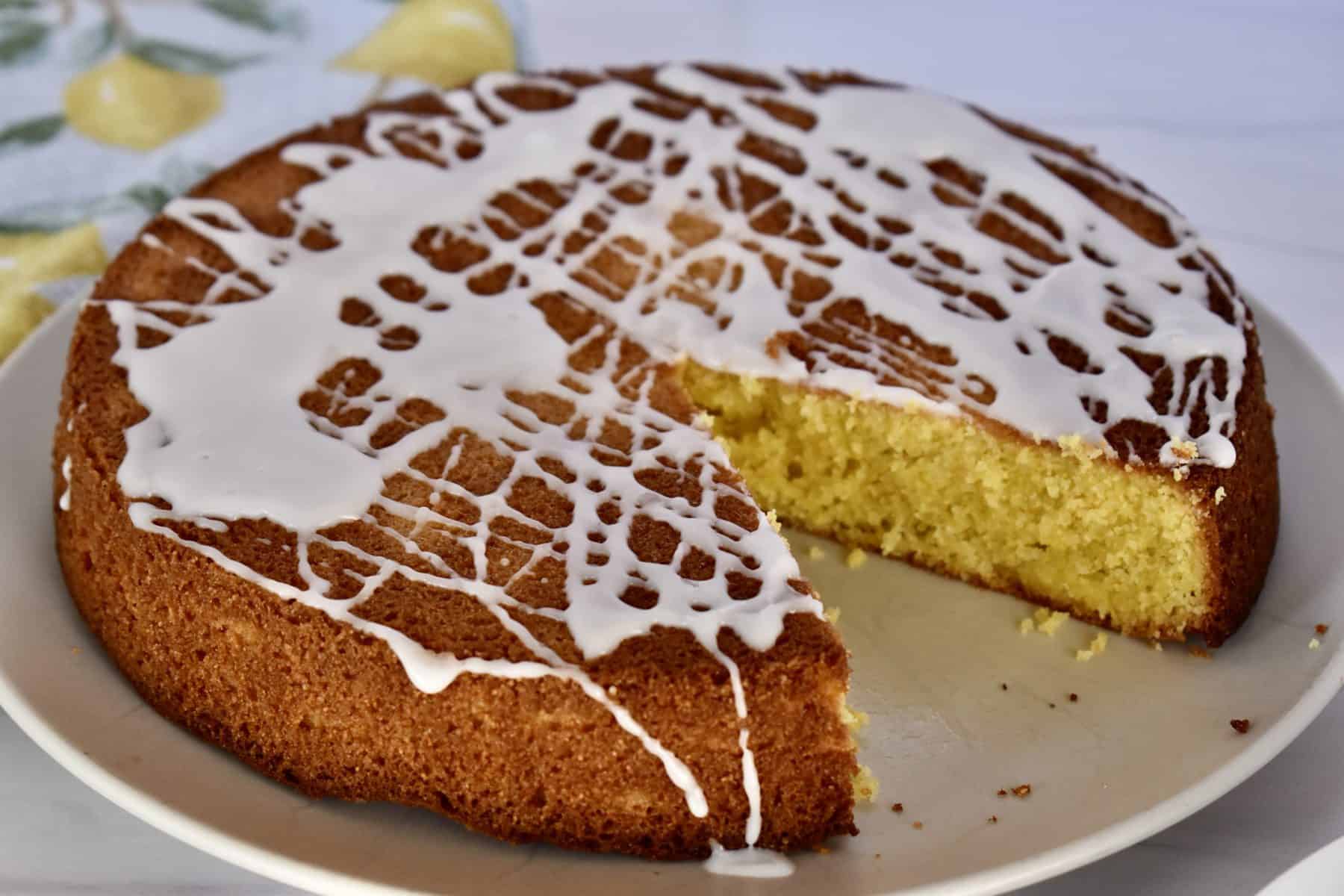Lemon Polenta Cake on a white plate. 