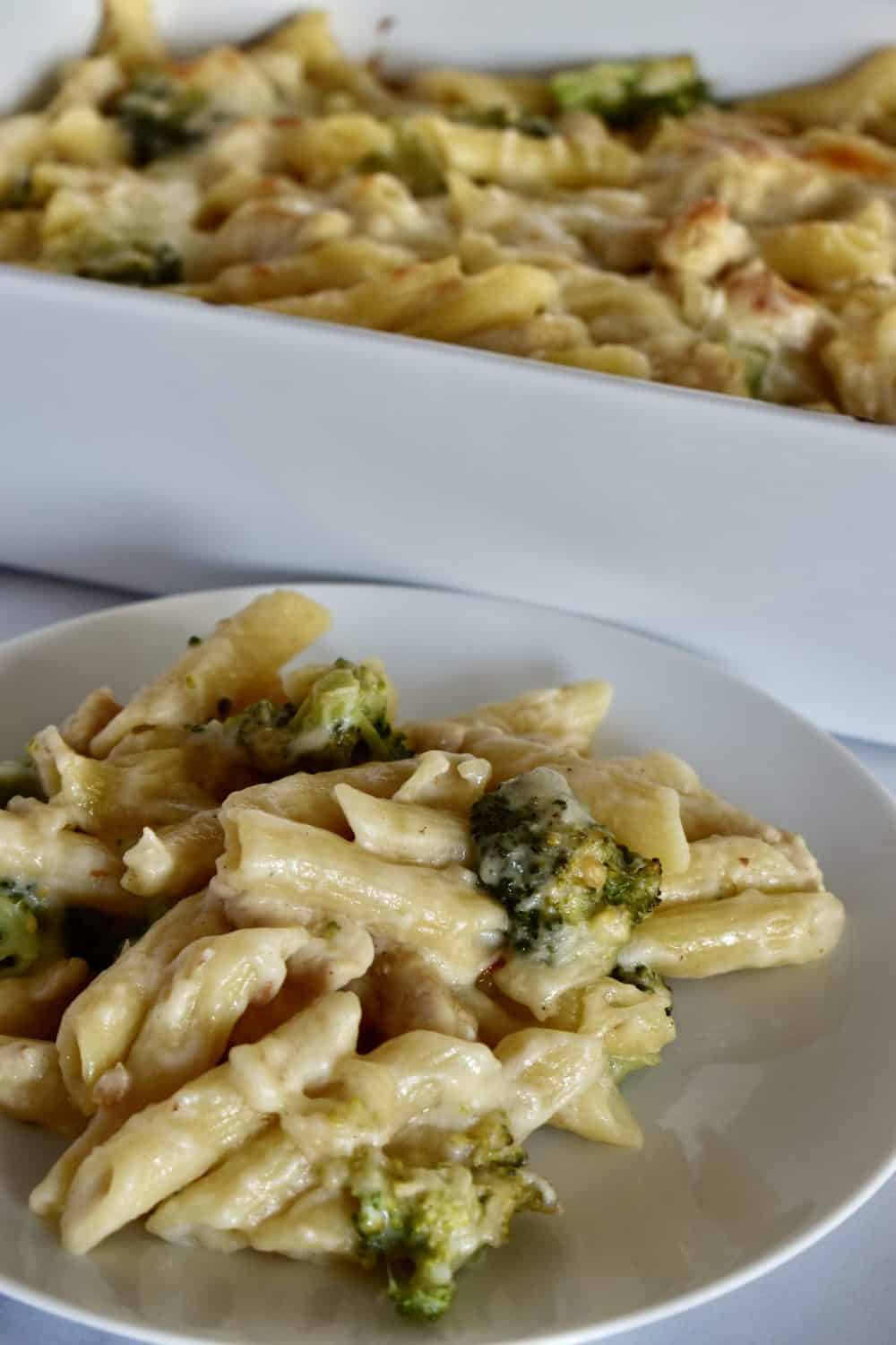 Baked Chicken Broccoli Alfredo on a white plate. 