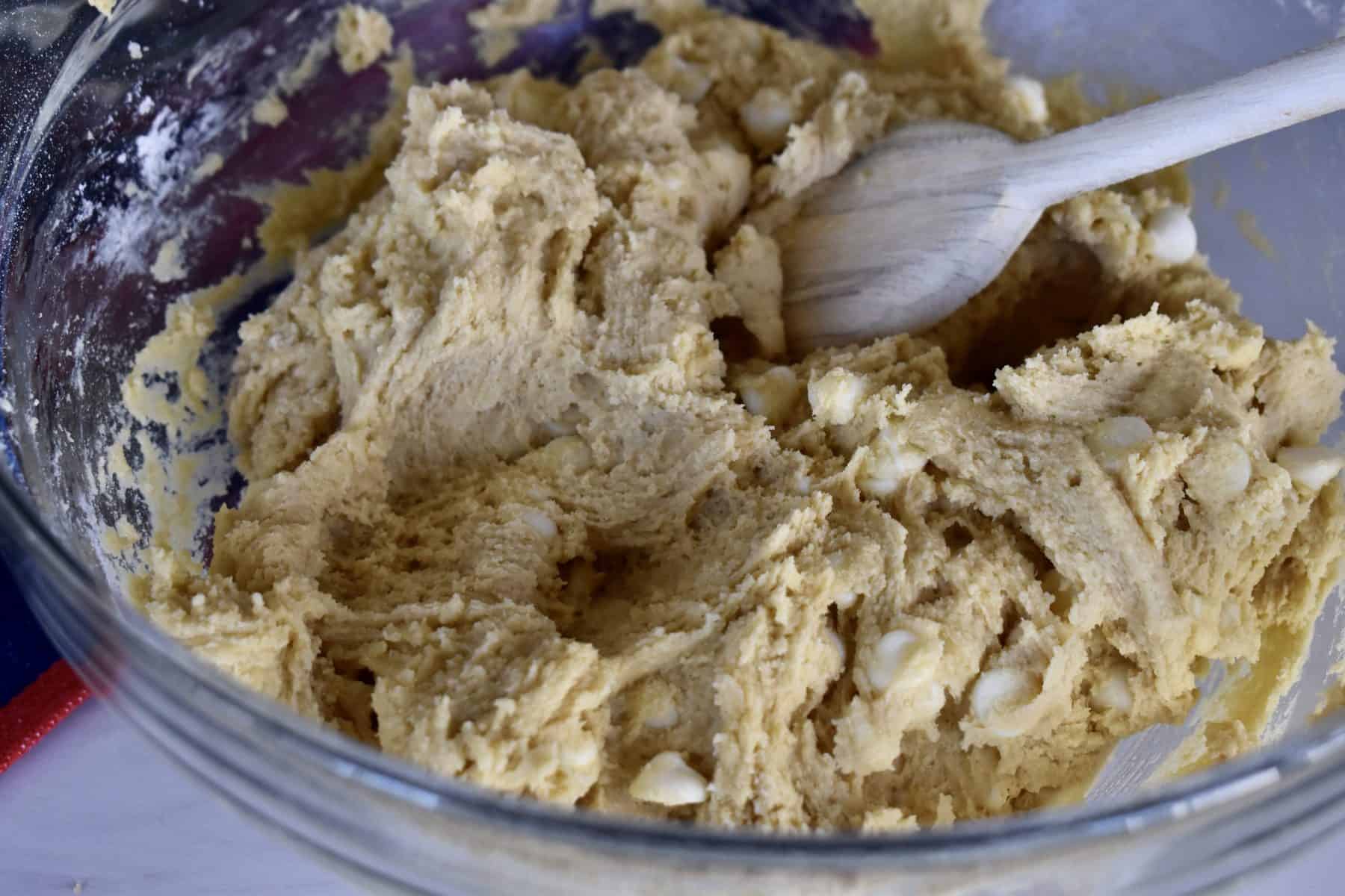 bowl of cookie dough with a wooden spoon. 