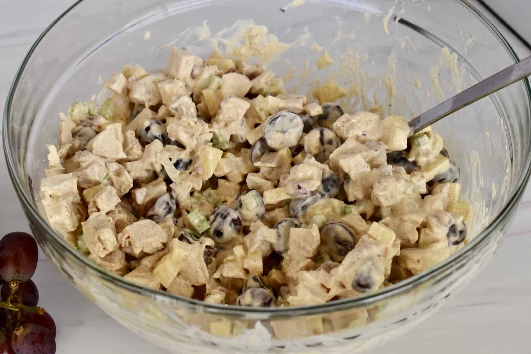 rotisserie chicken salad in a glass bowl. 