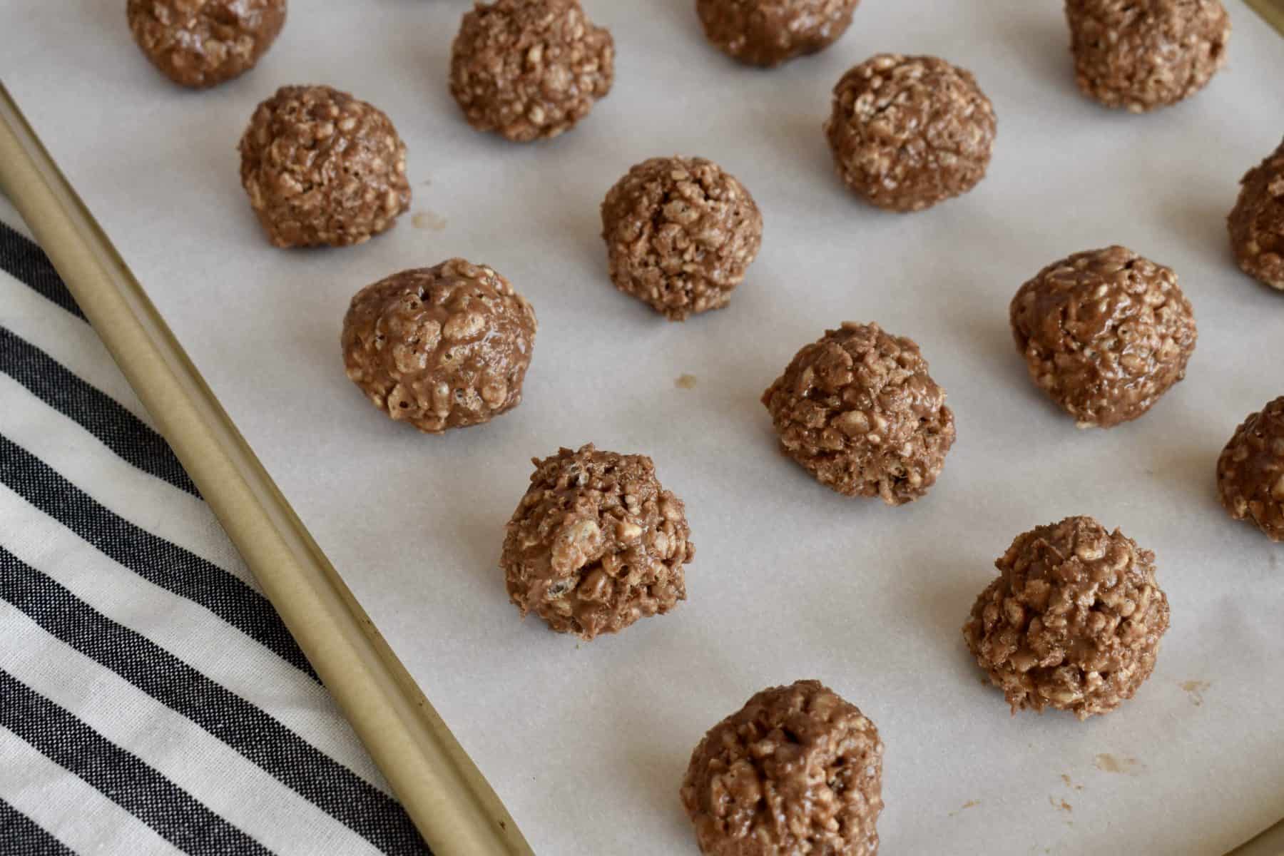 Crispy Nutella Truffles rolled out on a baking sheet. 