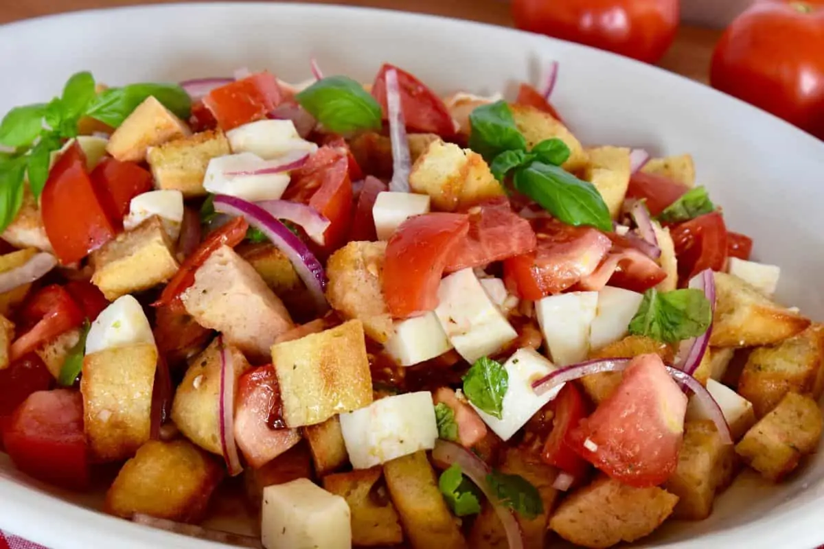 Bruschetta Salad in a white serving platter. 