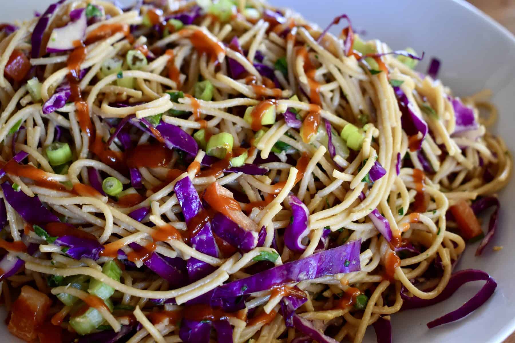 Cold Asian Noodle Salad in a white bowl. 