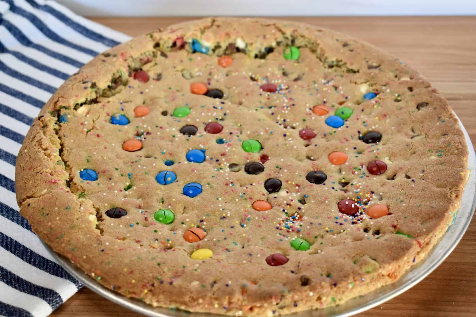 side angle of baked cookie pie on a counter. 