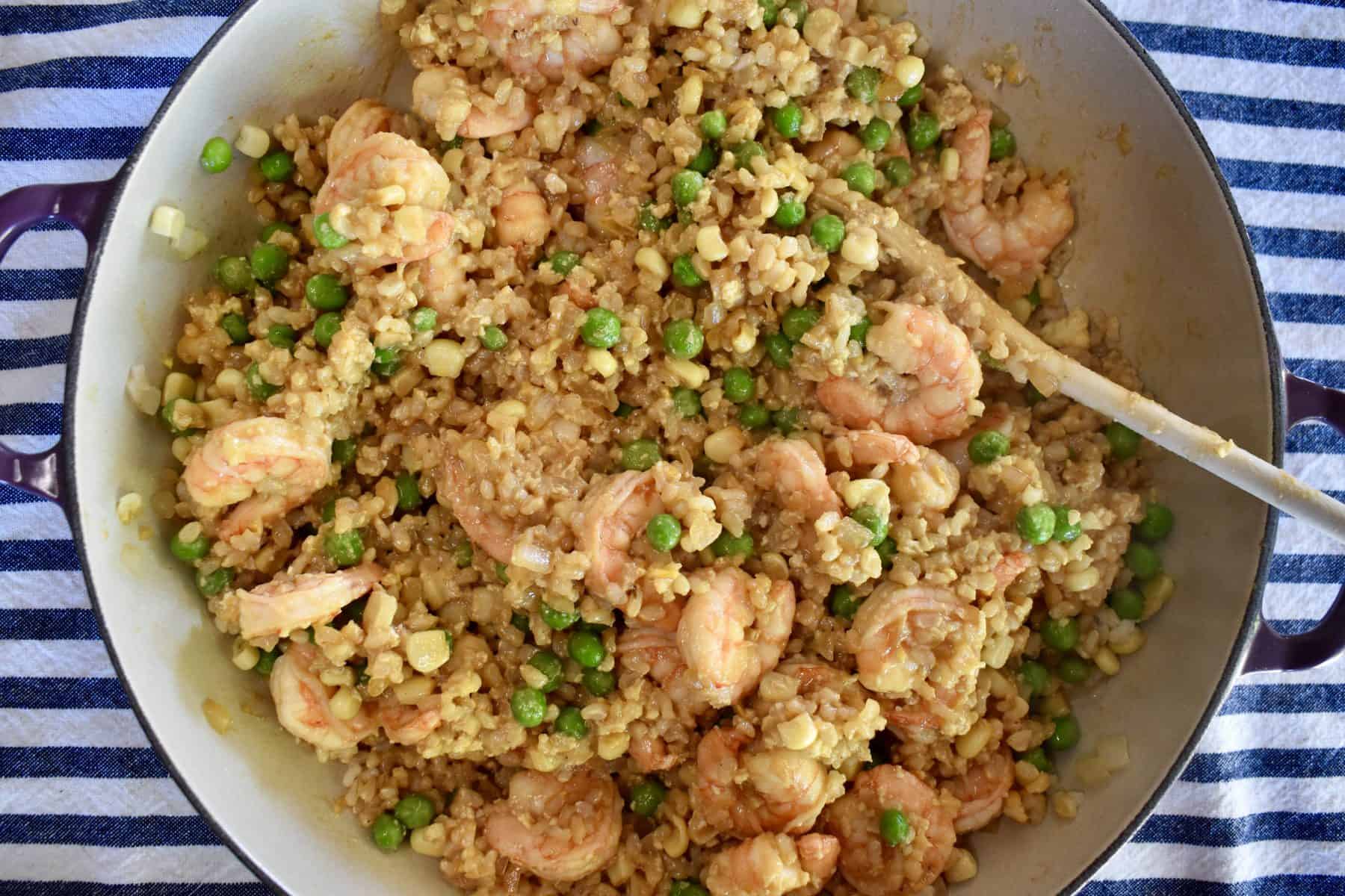 Overhead photo of shrimp fried brown rice in a pot. 