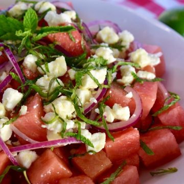 Watermelon feta salad in a white bowl.