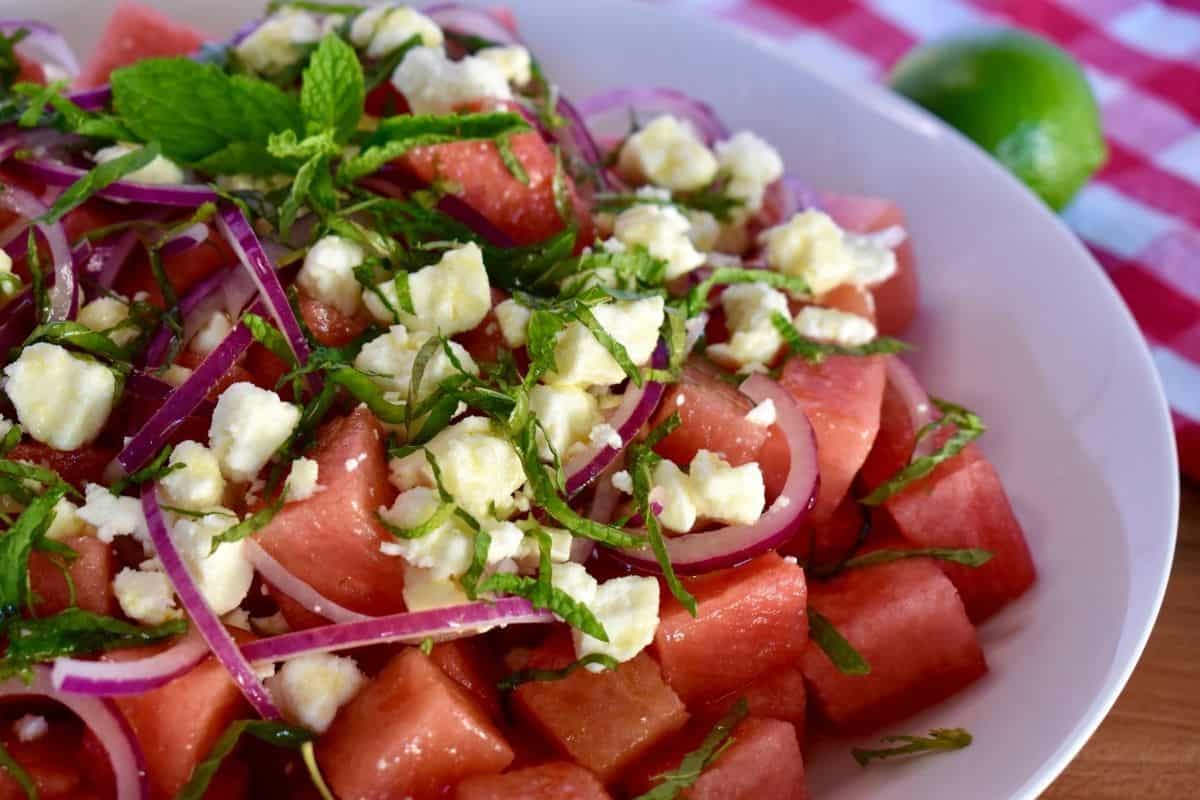 Watermelon feta salad in a white bowl. 