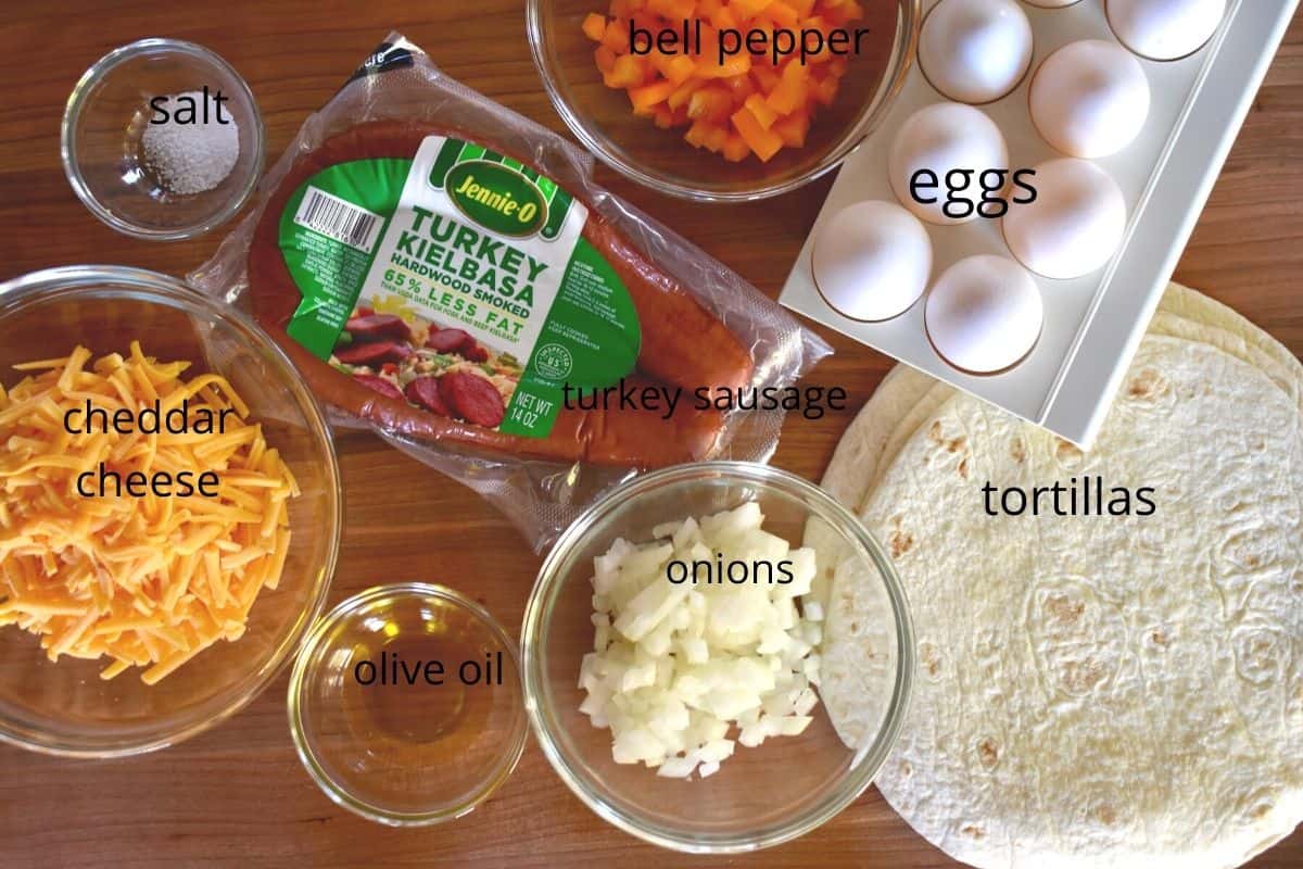 overhead photo of all of the ingredients needed for this recipe on a wood cutting board. 