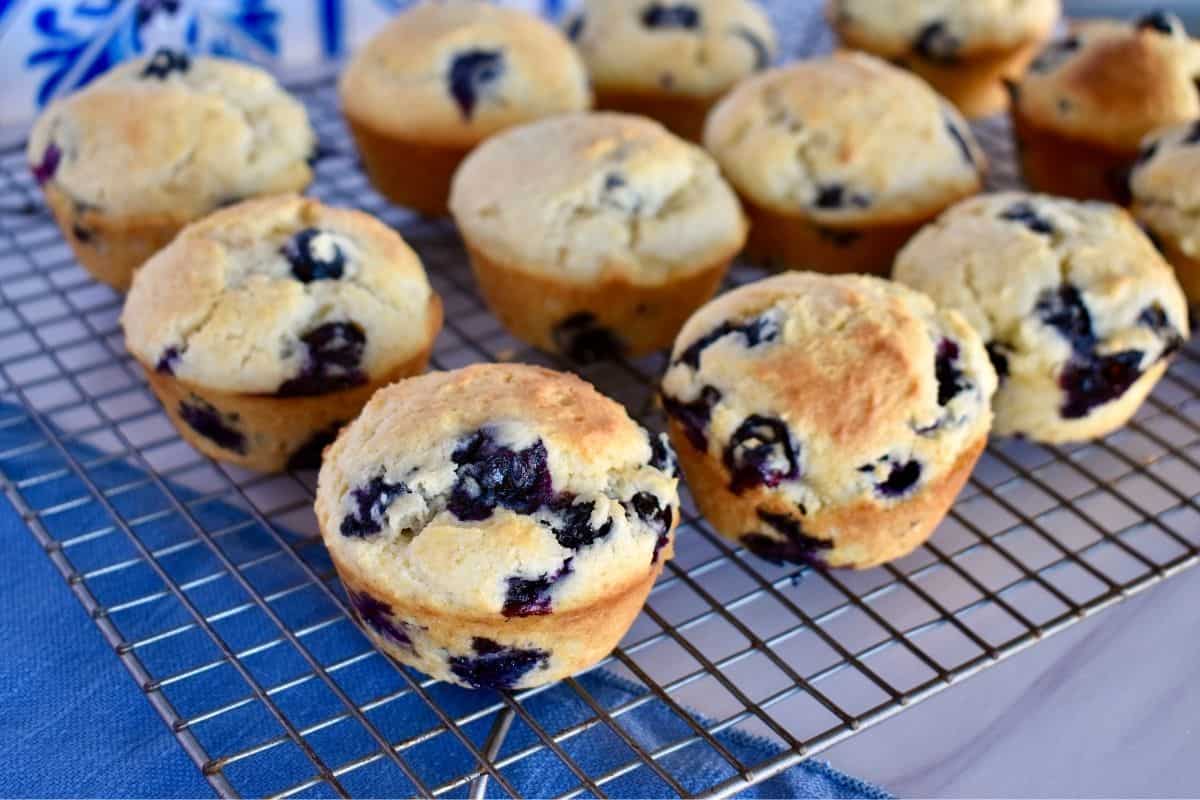 Blueberry Ricotta Muffins on a cooling rack. 