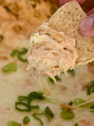 slow cooker buffalo chicken dip with raw chicken.