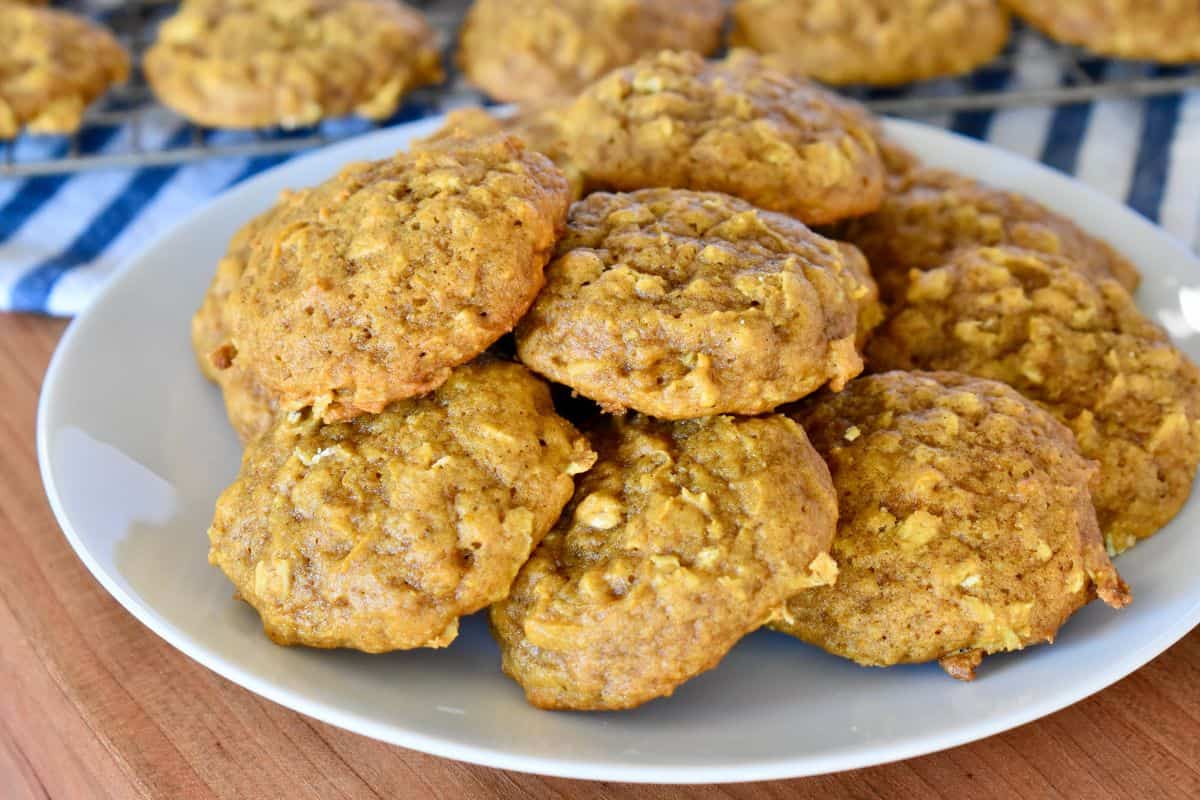 Pumpkin spice cookies on a white plate. 