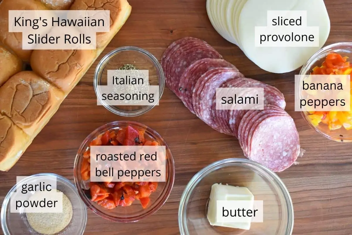 overhead photo of ingredients including salami, provolone, and King's Hawaiian Sweet Rolls 