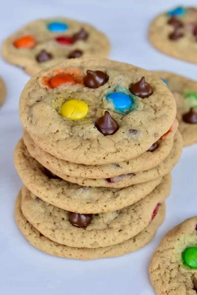 M&M Chocolate Chip Cookies stacked on each other. 