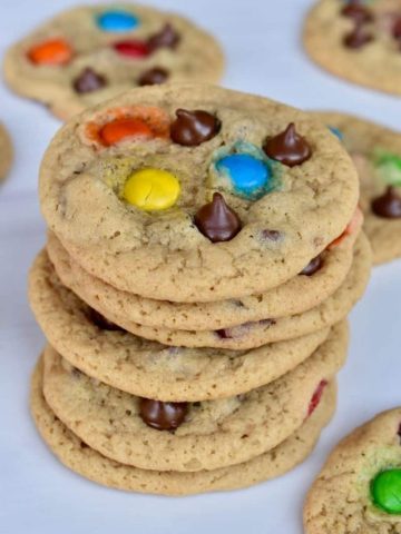 M&M Chocolate Chip Cookies stacked on each other.