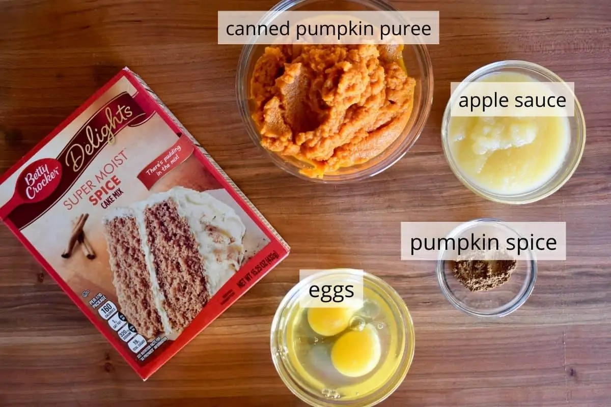 overhead photo of ingredients needed to make recipe including boxed spice cake mix. 