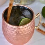 Apple Cider Moscow Mule in a copper mug.