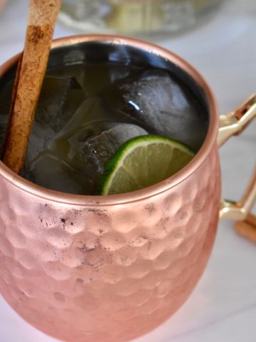 Apple Cider Moscow Mule in a copper mug.