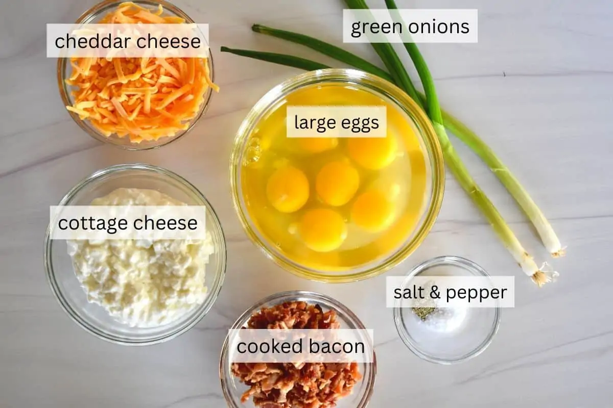 Ingredients including eggs, bacon, and seasonings. 