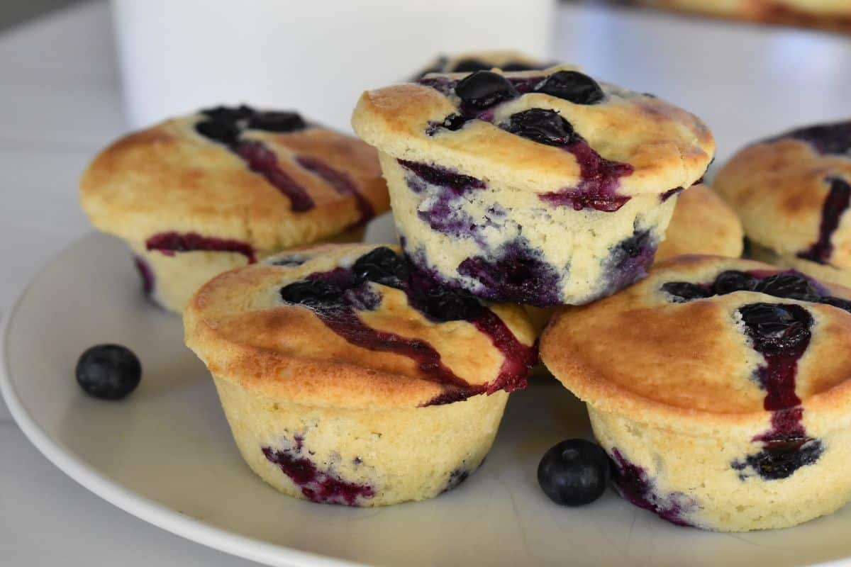 Blueberry Pancake Mix Muffins on a white plate. 