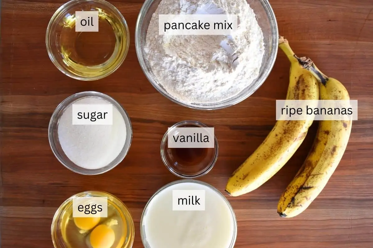 Overhead photo of ingredients needed for recipe including eggs, milk, sugar, and vanilla. 