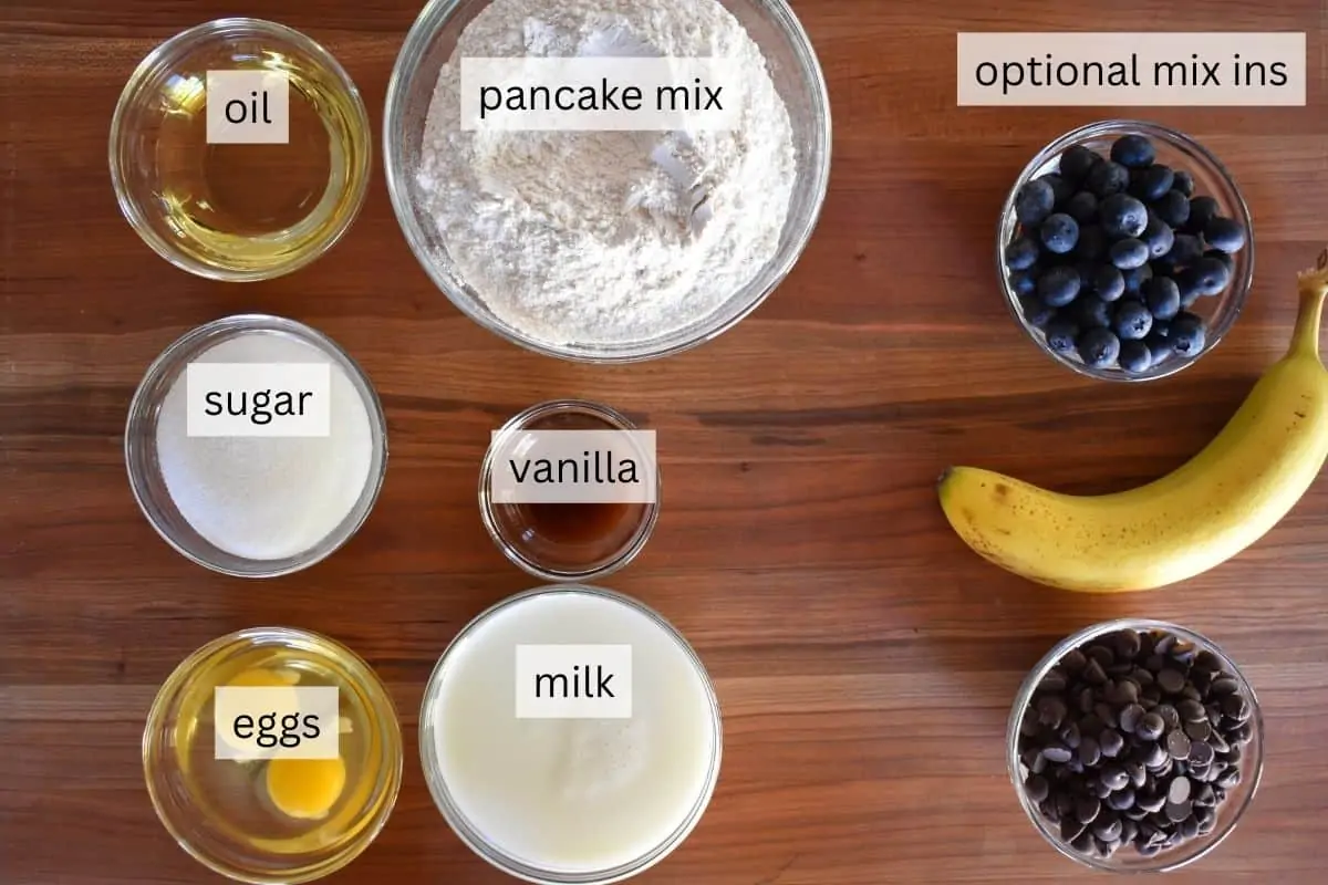 overhead photo of ingredients including oil, sugar, eggs, milk, and vanilla. 
