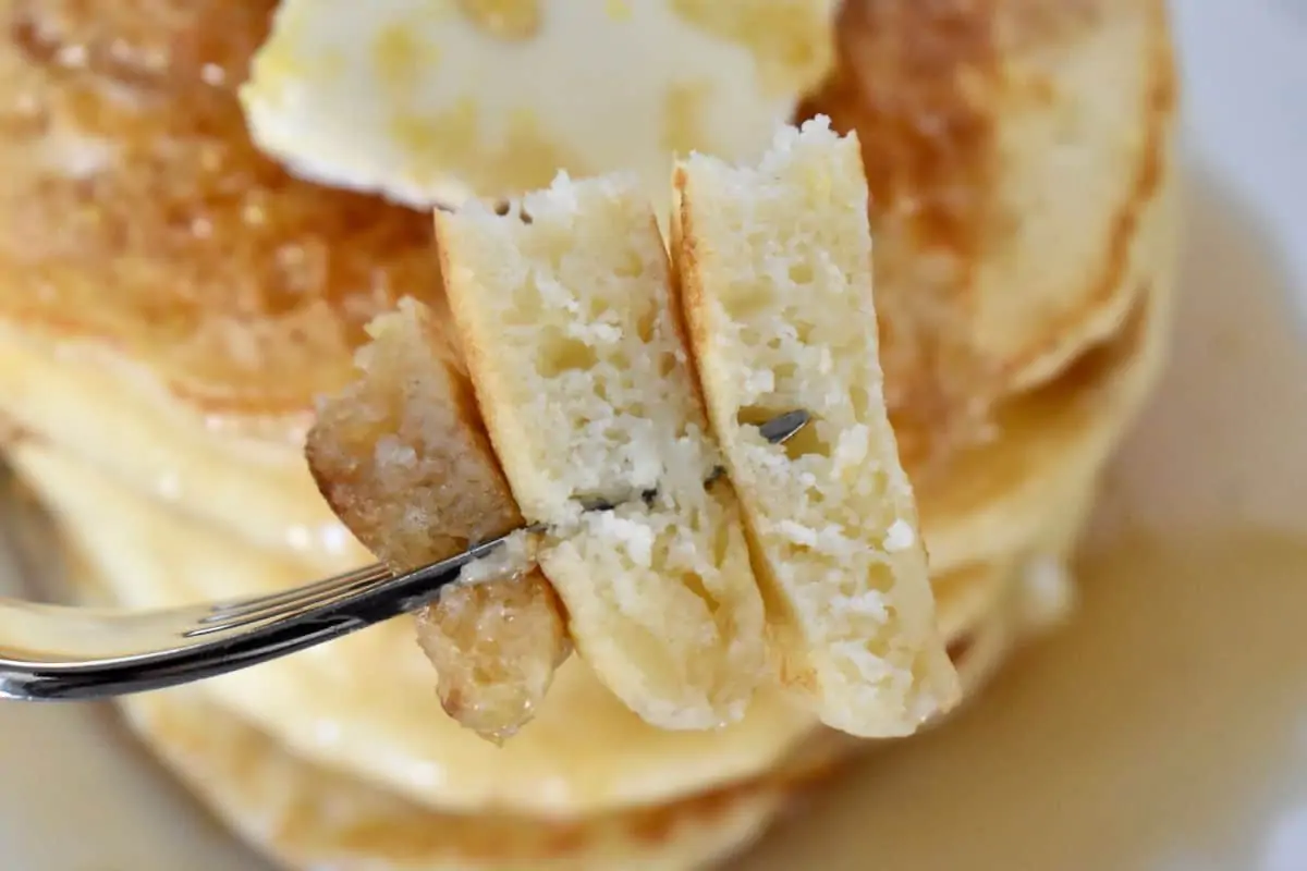 Lemon Ricotta Pancakes on a fork. 