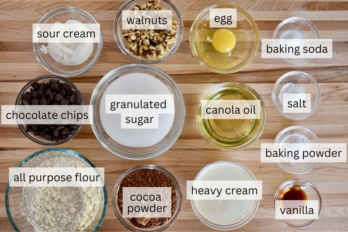 Ingredients including flour, sugar, egg, nuts, oil, and baking powder.