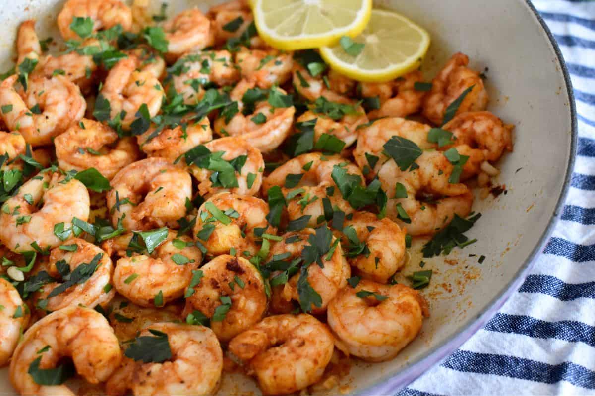 Pan Seared shrimp with garlic in a large pan. 