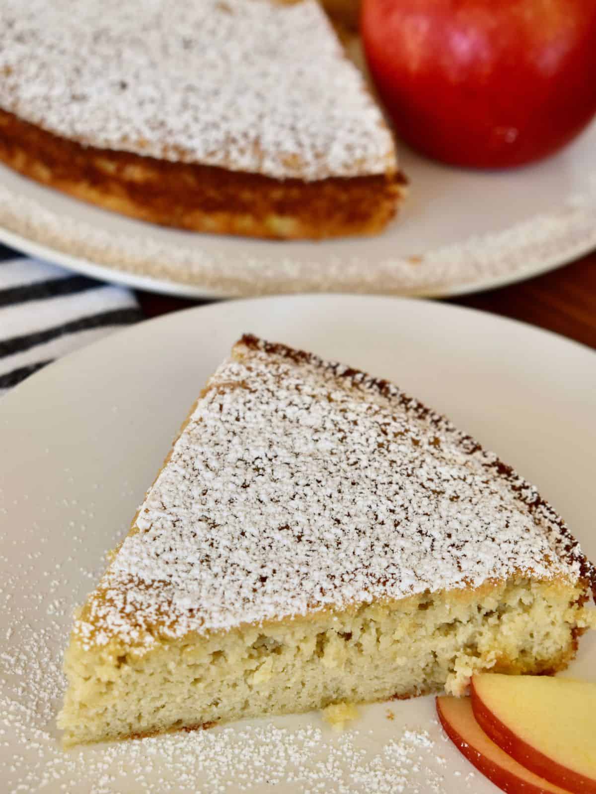Almond Flour Apple Cake slice on a white plate. 