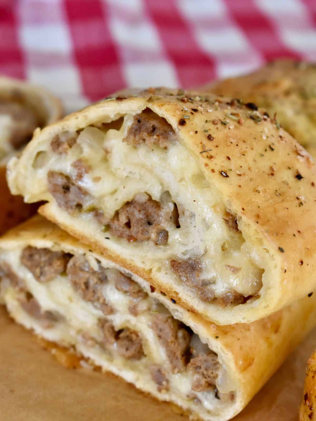 Italian Sausage Bread with pizza dough, Italian sausage, and mozzarella cheese. 