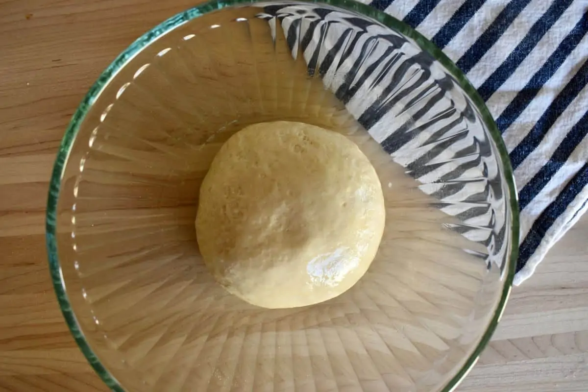 Recipe in a glass bowl for first rise. 