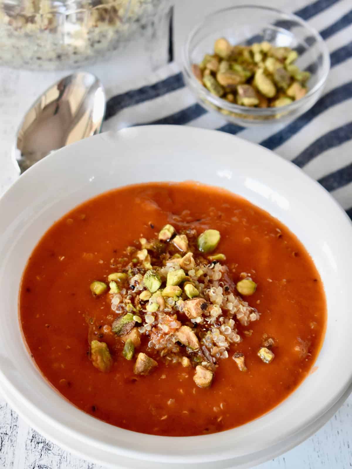 Tomato Quinoa Soup in a white bowl.