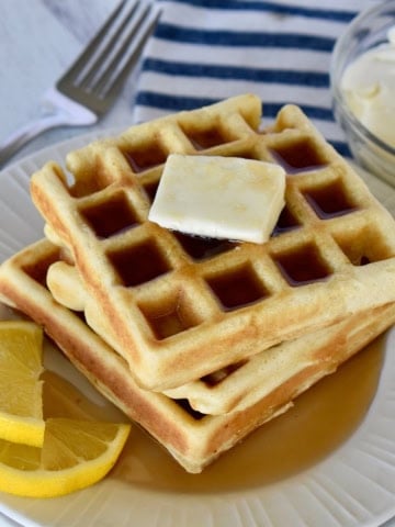 Lemon Ricotta Waffles on a white plate.