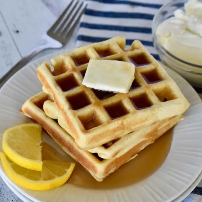 Lemon Ricotta Waffles on a white plate.